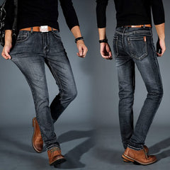 Men's stretch denim jeans, grey-blue slim fit, visible seams and tan leather label