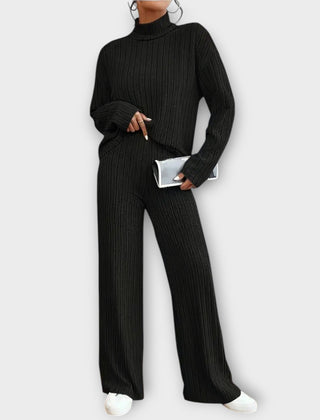 Black ribbed knit two-piece set with turtleneck top and wide-leg pants