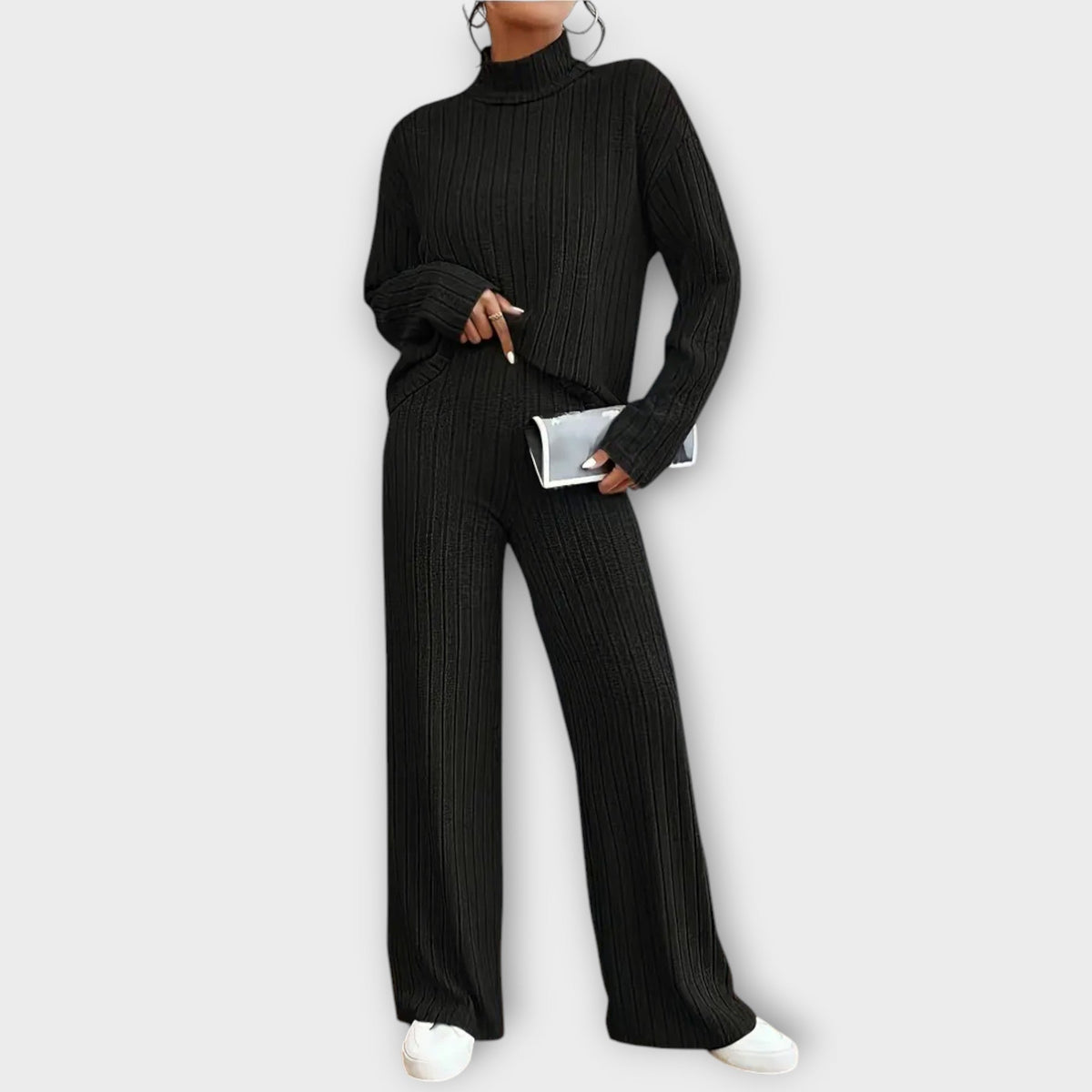 Black ribbed knit two-piece set with turtleneck top and wide-leg pants