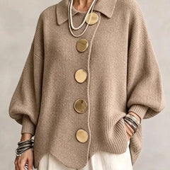 Oversized tan collared button cardigan with long balloon sleeves and round buttons
