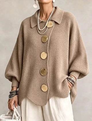 Oversized tan collared button cardigan with long balloon sleeves and round buttons