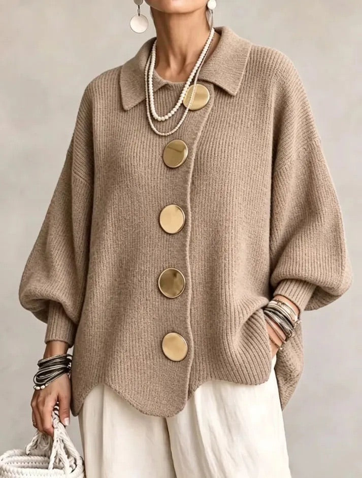 Oversized tan collared button cardigan with long balloon sleeves and round buttons