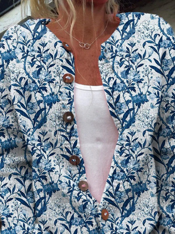 Women’s vintage knit cardigan sweater, blue botanical print with brown button placket
