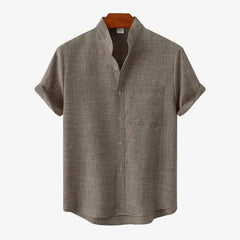 Short-sleeve button-up shirt in medium brown with button front and chest pocket