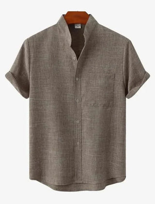Short-sleeve button-up shirt in medium brown with button front and chest pocket