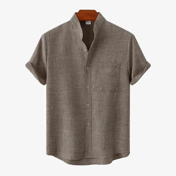 Short-sleeve button-up shirt in medium brown with button front and chest pocket