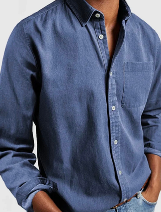 Blue denim shirt with button-up front and chest pocket
