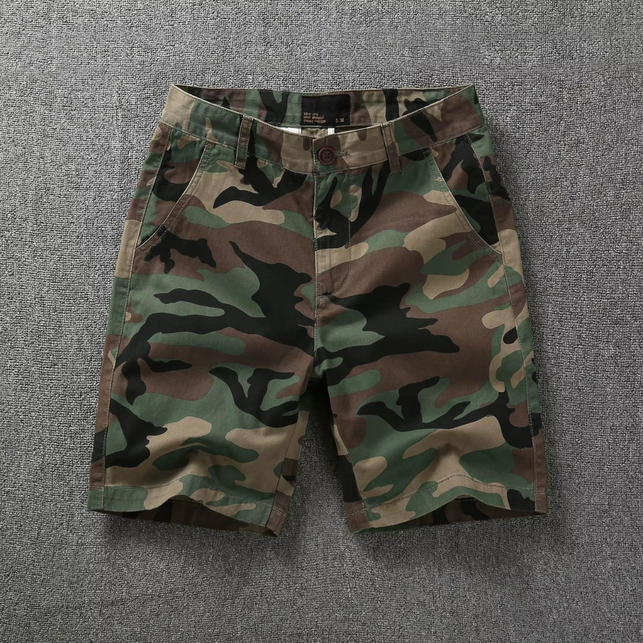 Camouflage tactical flex shorts with belt loops, button fly, and side pockets