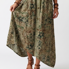 Green embroidered midi dress detail with buttons and oversized gathered pockets