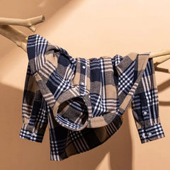 Plaid cotton flannel button-up shirt, tan and navy checks with long sleeves.