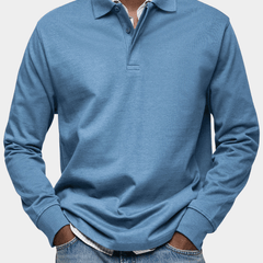 Men's long-sleeve polo shirt in light blue, button placket and ribbed cuffs
