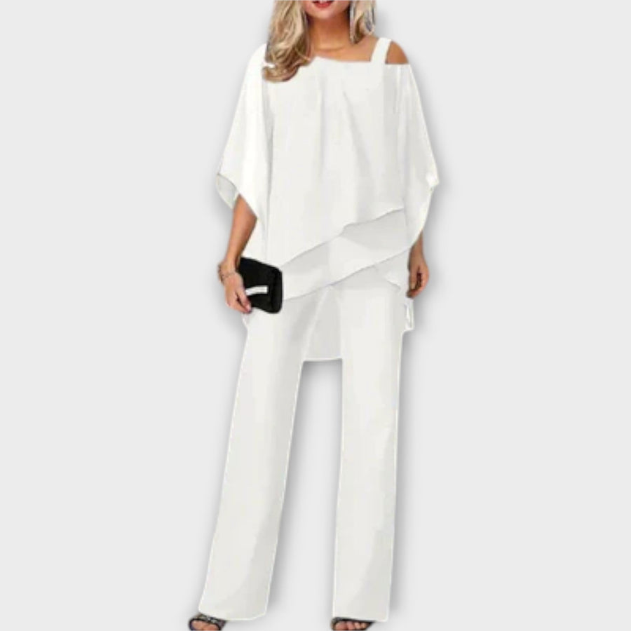 White chiffon draped off-shoulder top and wide-leg trousers evening set