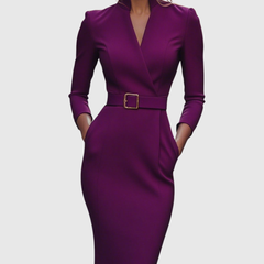Plum fitted midi dress with V-neck, long sleeves, and waist belt with square gold buckle.
