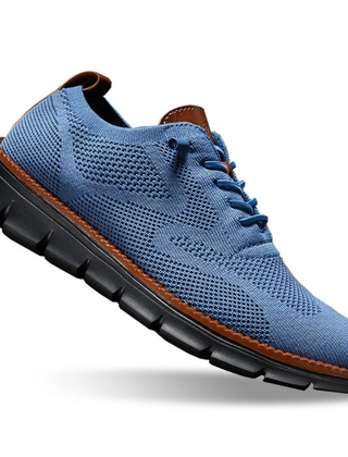 Light blue knit lace-up walker shoes with blue laces, brown collar trim, black tread sole