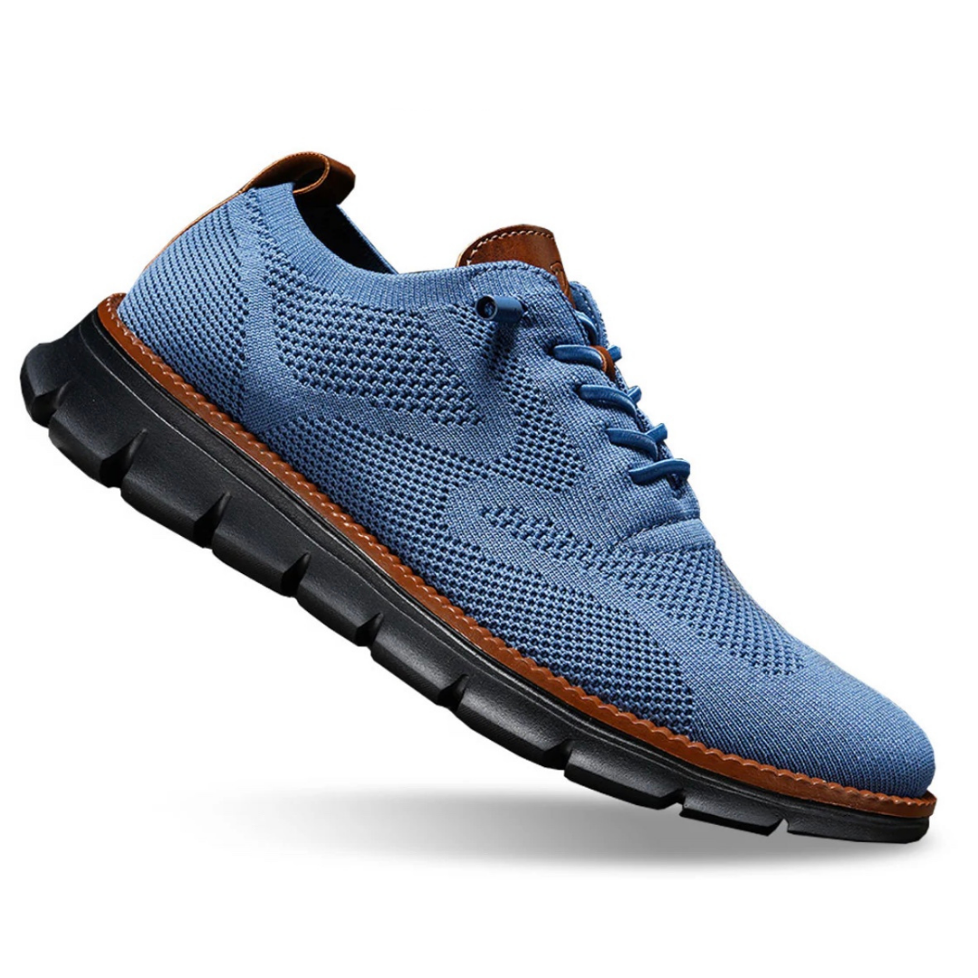 Light blue knit lace-up walker shoes with blue laces, brown collar trim, black tread sole