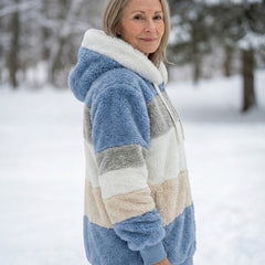 Plush colorblock jacket in blue, cream, and gray, zip front with hood and drawstrings