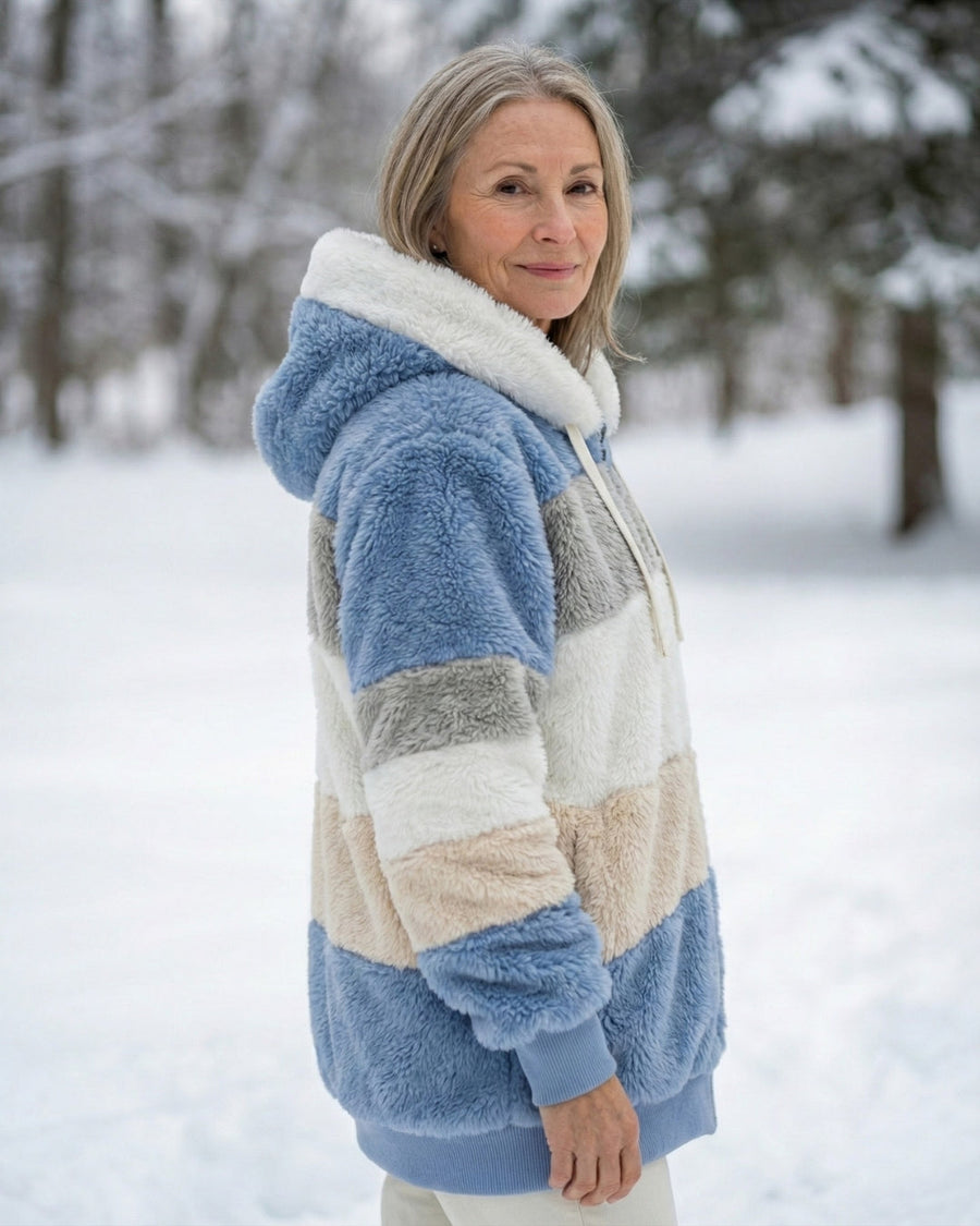 Plush colorblock jacket in blue, cream, and gray, zip front with hood and drawstrings