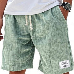 Everyday shorts in green linen-look fabric with drawstring and side slant pockets