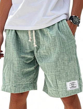 Everyday shorts in green linen-look fabric with drawstring and side slant pockets