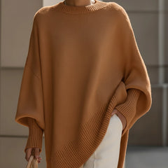 Grey drop-shoulder knit jumper with ribbed crew neck and slouchy draped side