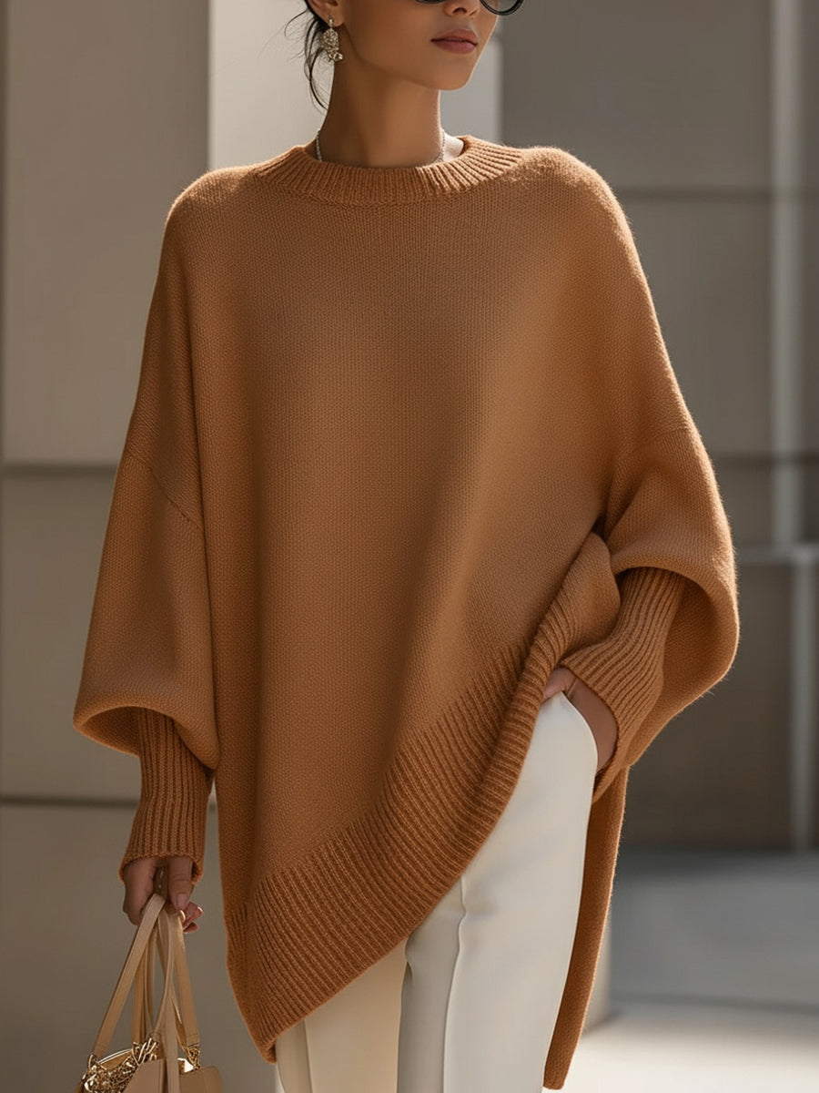 Grey drop-shoulder knit jumper with ribbed crew neck and slouchy draped side