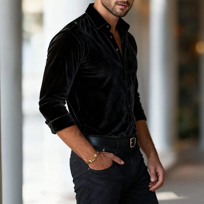 Black velvet button-up shirt, long sleeves, pointed collar, side view.