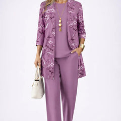 Mauve purple 3-piece outfit with floral open jacket, matching blouse, and tapered trousers
