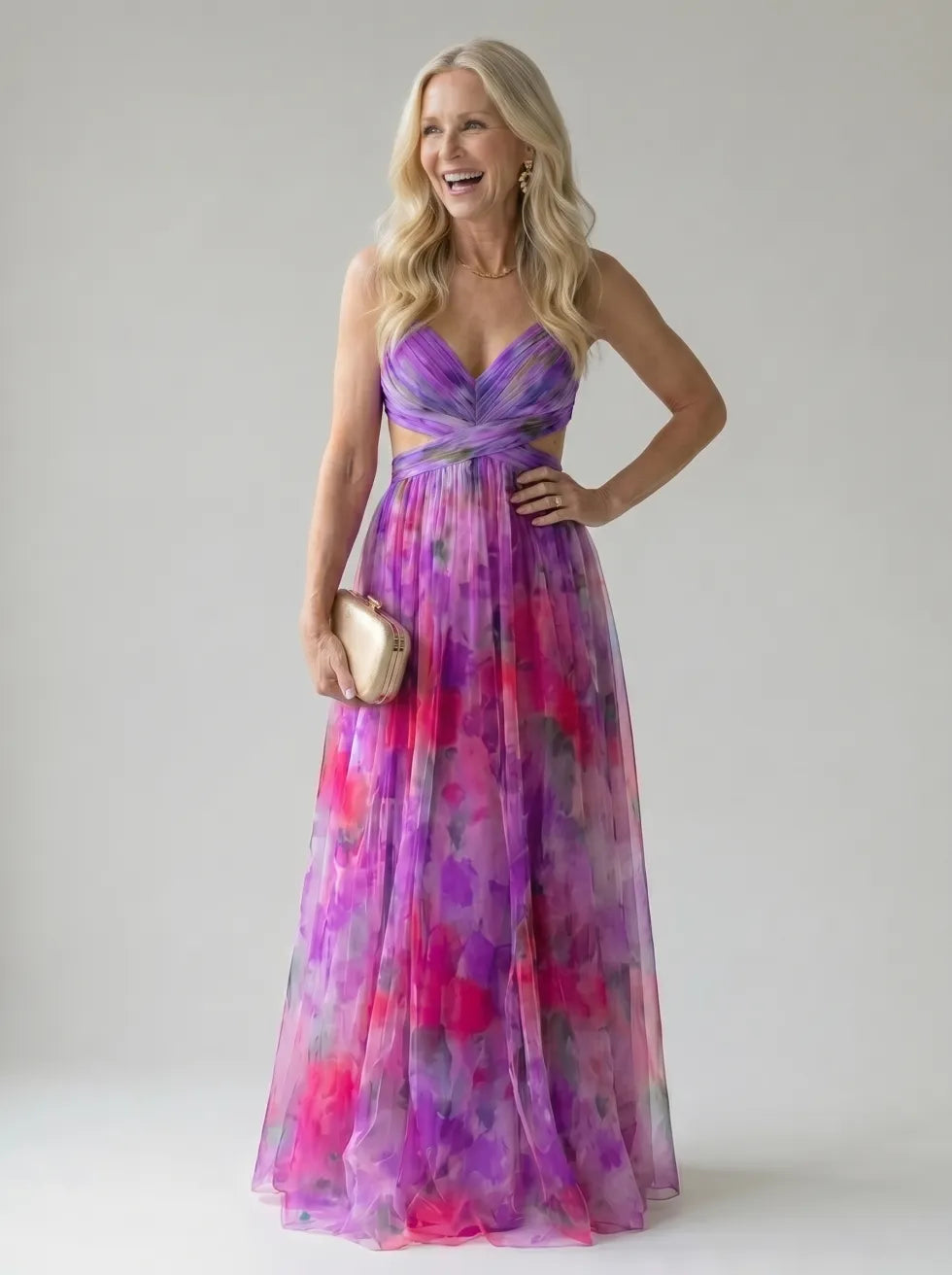Purple and pink multicolor maxi wrap dress with V-neck, sleeveless bodice, and waist tie.
