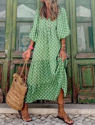 Green patterned maxi dress with V-neck and three-quarter puff sleeves