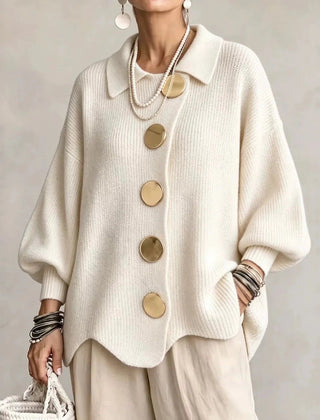Oversized cream collared button cardigan with long balloon sleeves and large round buttons