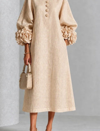 Beige floral midi dress with button front and rose-cuff puff sleeves, front view