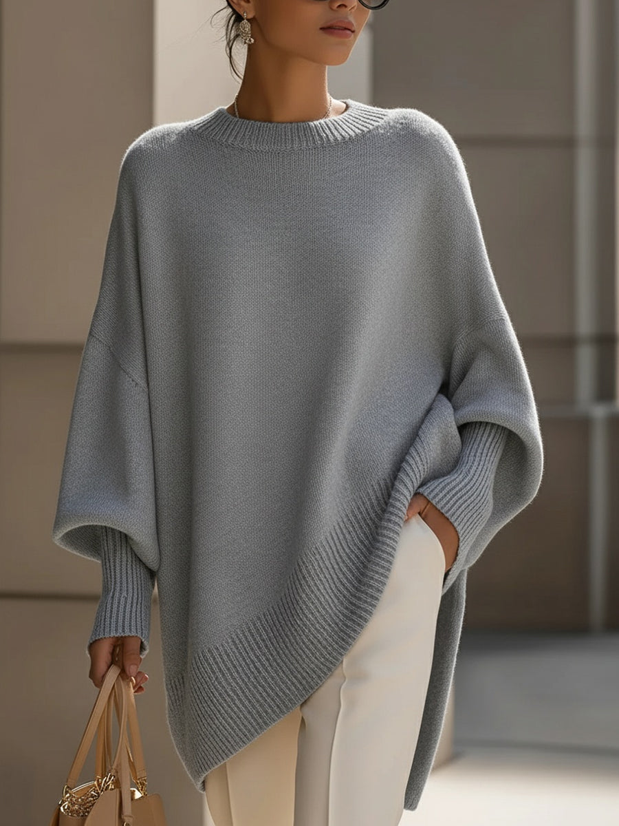 Grey knit jumper sleeve and hem with ribbed trim, drop-shoulder knit