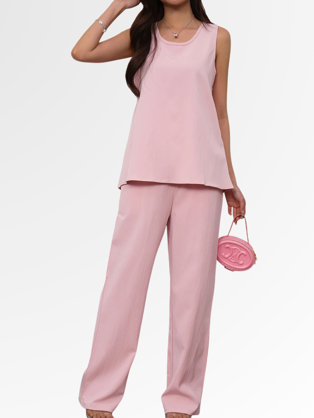 Relaxed blush pink sleeveless top and wide-leg pants two-piece set, loose fit
