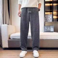 Charcoal textured tapered pants with elastic waistband and drawstring ties