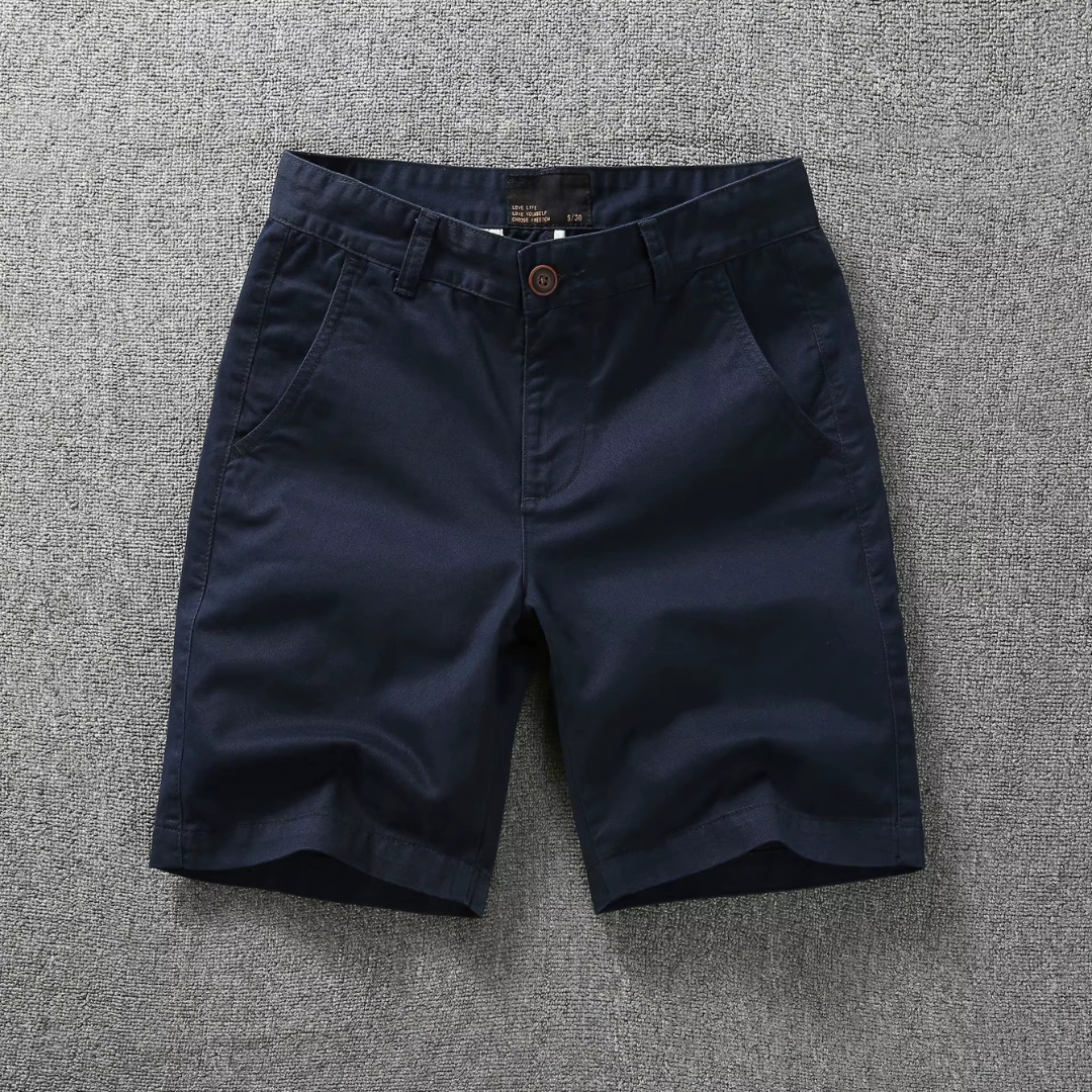 Solid navy tactical flex shorts with belt loops and button fly, side pockets