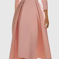 Blazer-style pleated midi dress close-up, blush pink, buttoned waist and structured seams
