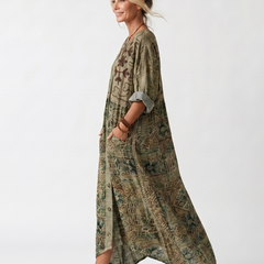 Green button-front embroidered midi dress with oversized pockets and short sleeves