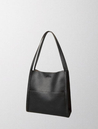 Black vegan leather shoulder bag with top handles and clean, structured front