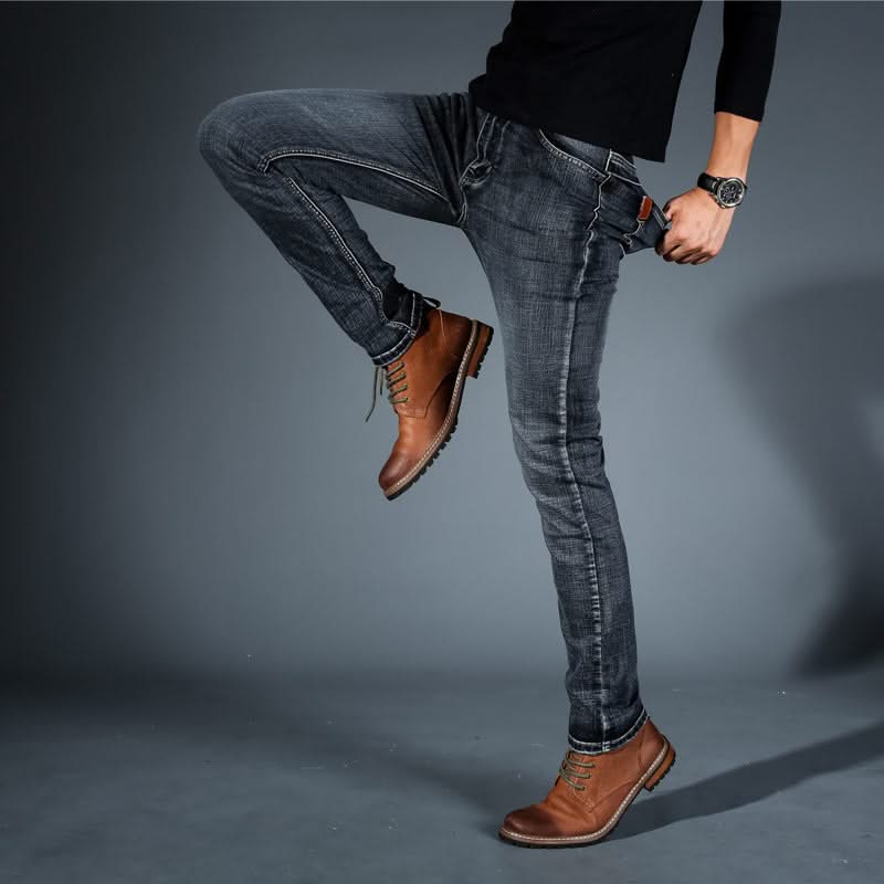 Men's stretch denim jeans, blue slim fit, slim leg with tan leather patch