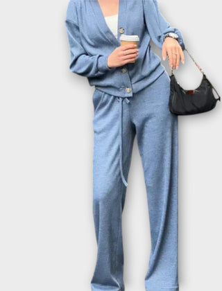 Blue cardigan and drawstring trouser set, button front, relaxed long-sleeve fit.