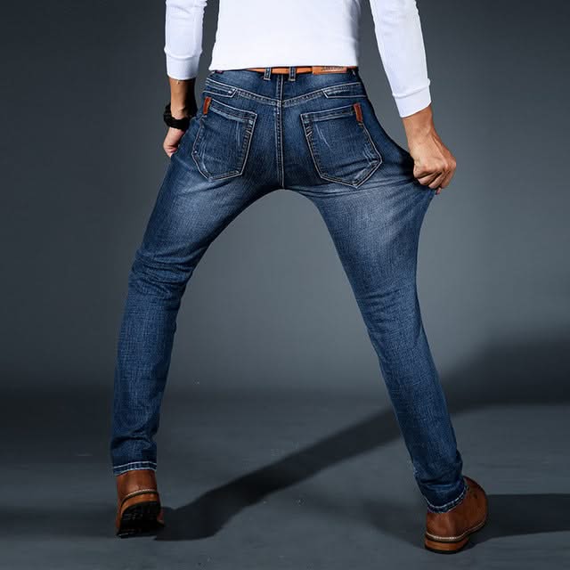 Men's stretch denim jeans, dark blue slim fit, rear pockets with tan leather trim