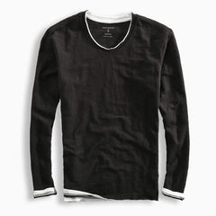 Black cotton shirt with V-neck and long sleeves, ribbed cuffs