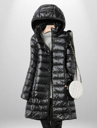 Black hooded ultralight puffer down jacket with full-length zip and long coat hem.