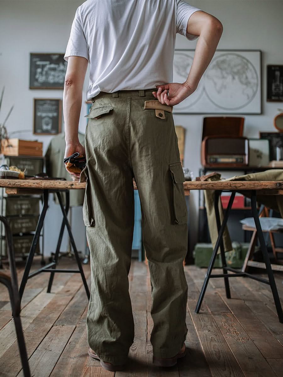 Army green cargo trousers with stacked cargo pockets and adjustable waistband