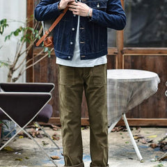 Olive straight fatigue pants with cargo-style side pockets and drawstring waist
