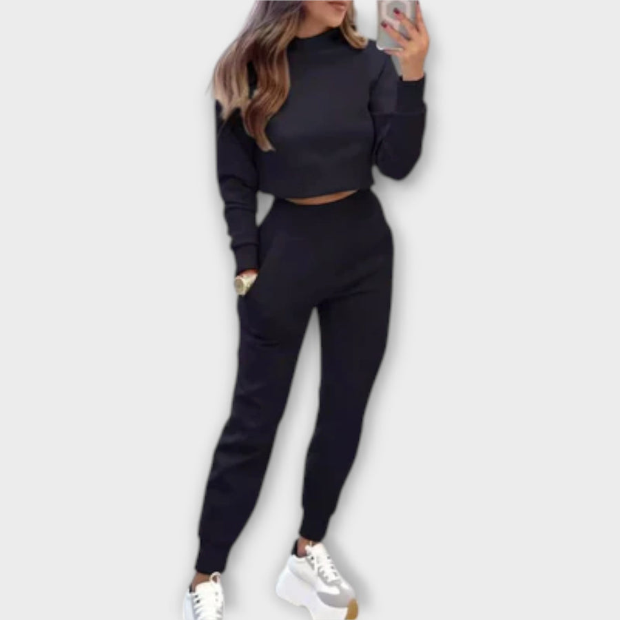 Black casual tracksuit set with cropped sweatshirt and matching jogger pants