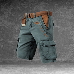 DUNMERE utility shorts in teal green with cargo side pockets and logo patch