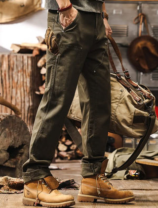 Army green straight-leg utility pants with zip fly and roomy thigh pockets