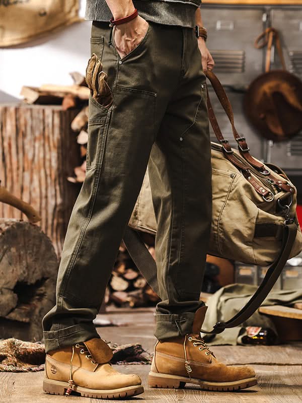 Army green straight-leg utility pants with zip fly and roomy thigh pockets