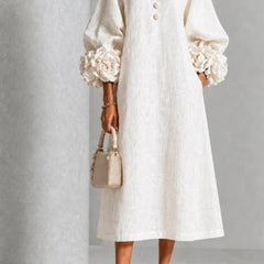 White floral midi dress with button front and rose-cuff puff sleeves, front view